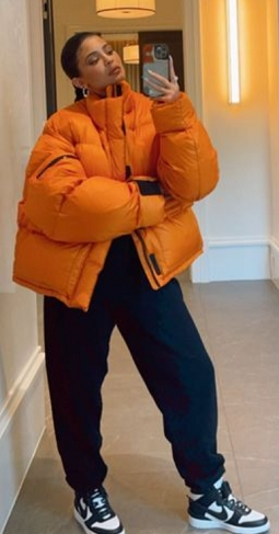 Kylie-Jenner-orange-bomber.png